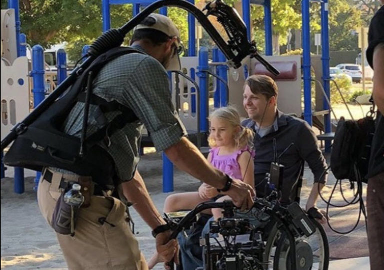 toby forrest with girl on tv set